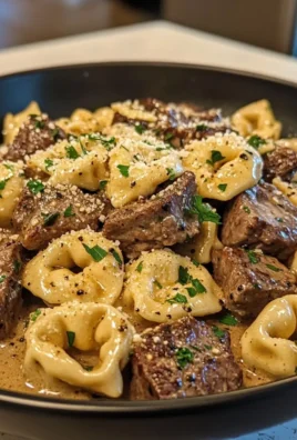 Irresistible Cracked Garlic Steak Tortellini in Creamhouse Sauce Bliss – A Delicious Skillet Dinner