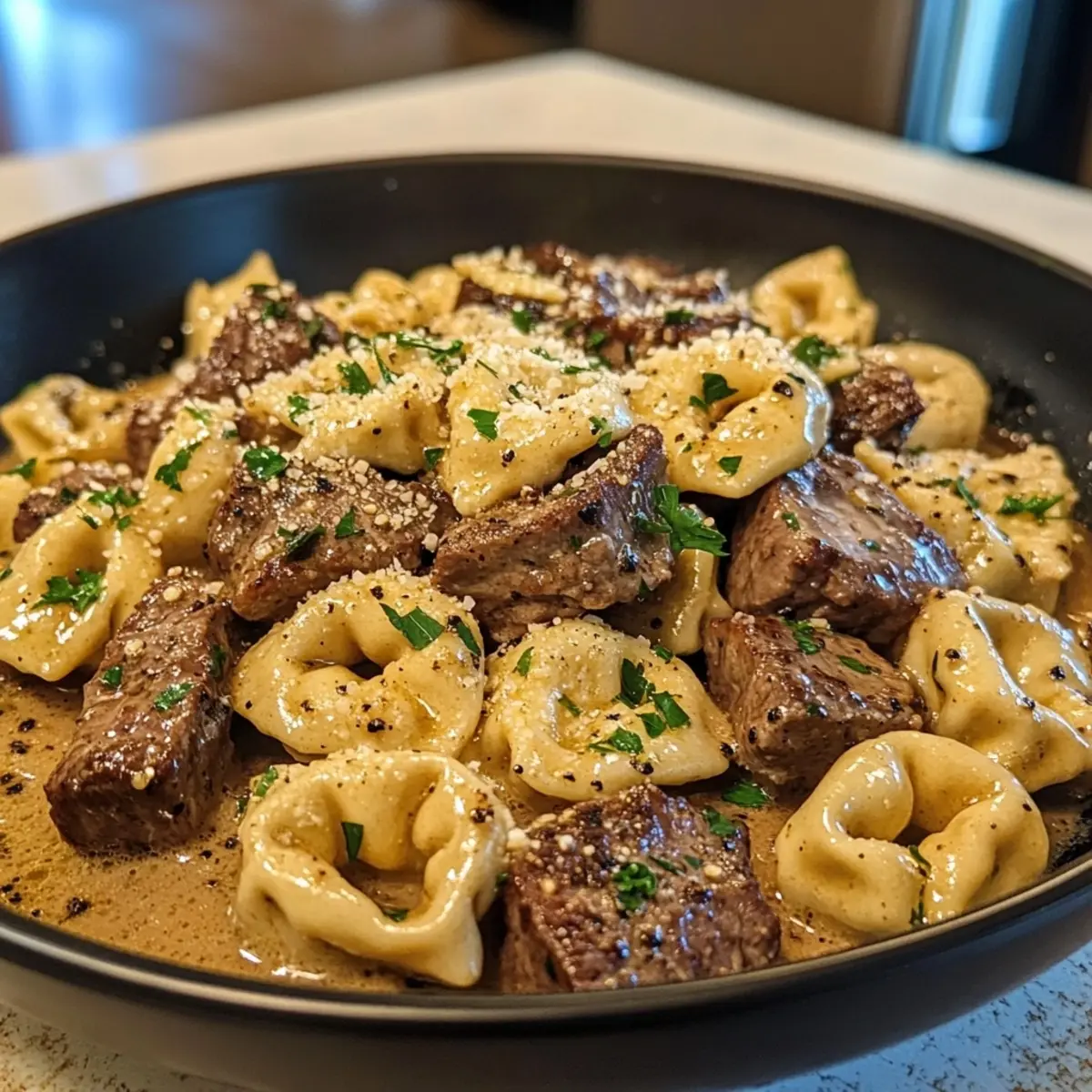 Irresistible Cracked Garlic Steak Tortellini in Creamhouse Sauce Bliss – A Delicious Skillet Dinner